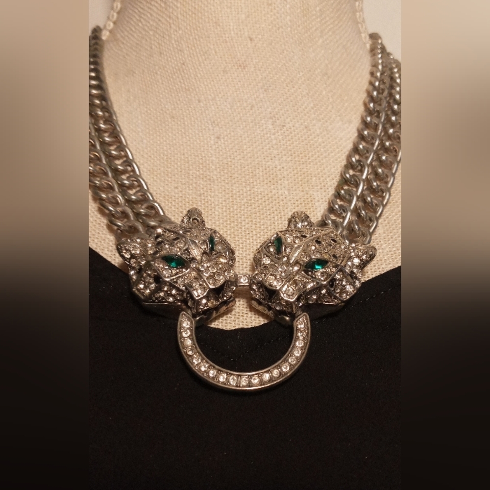 Gorgeous Necklace with Emerald like colored eyes. Beautiful and fun piece.